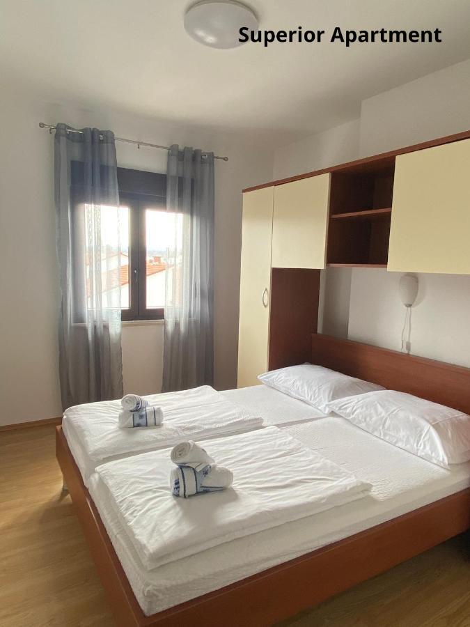 Apartments Zivko Malinska Bagian luar foto